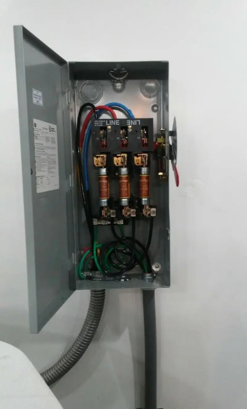 Three-phase disconnect switch installed for Smoke Detector Installation in Hamlet