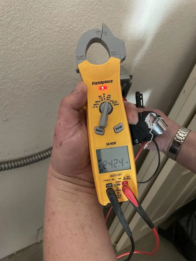 Voltage testing with clamp meter during Generator Installation in Hamlet